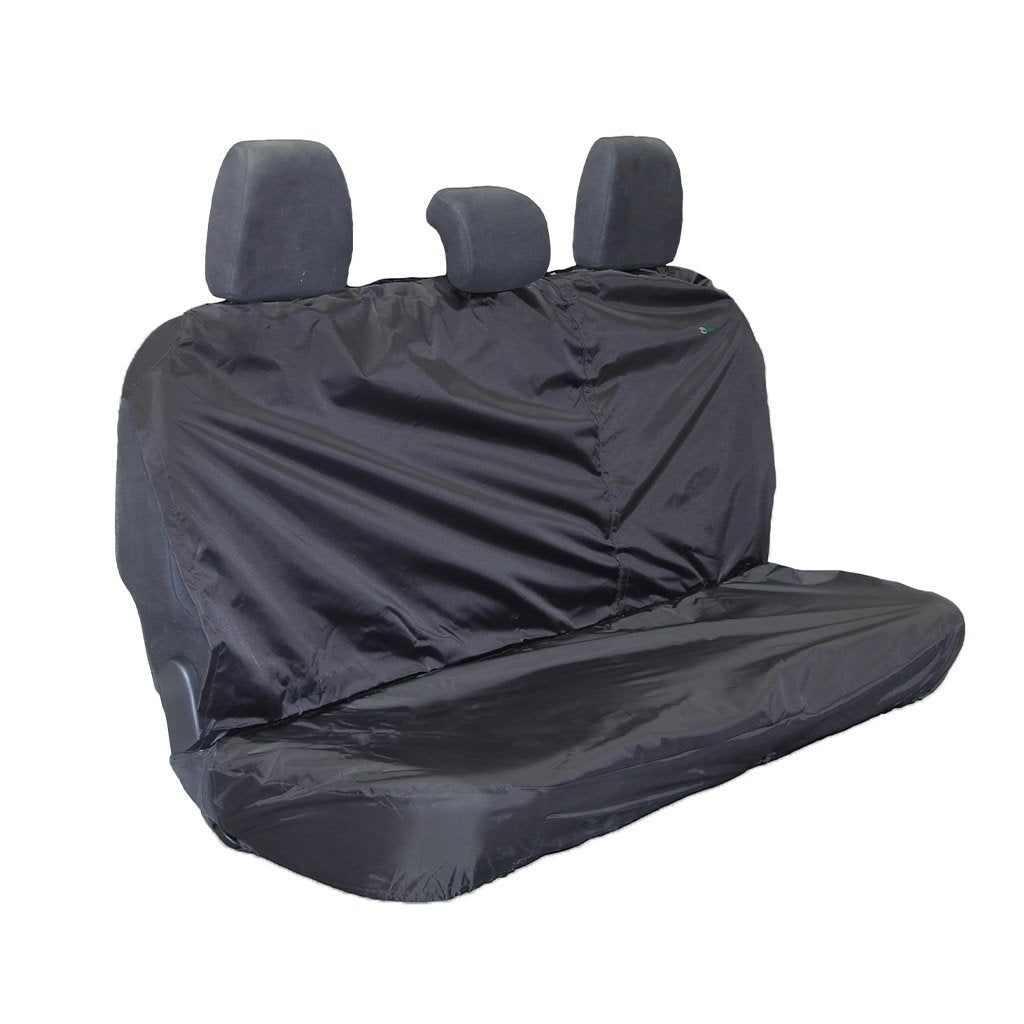 Black universal car seat covers fitted on the rear seats. Designed to protect from spills, food stains, and wear and tear.