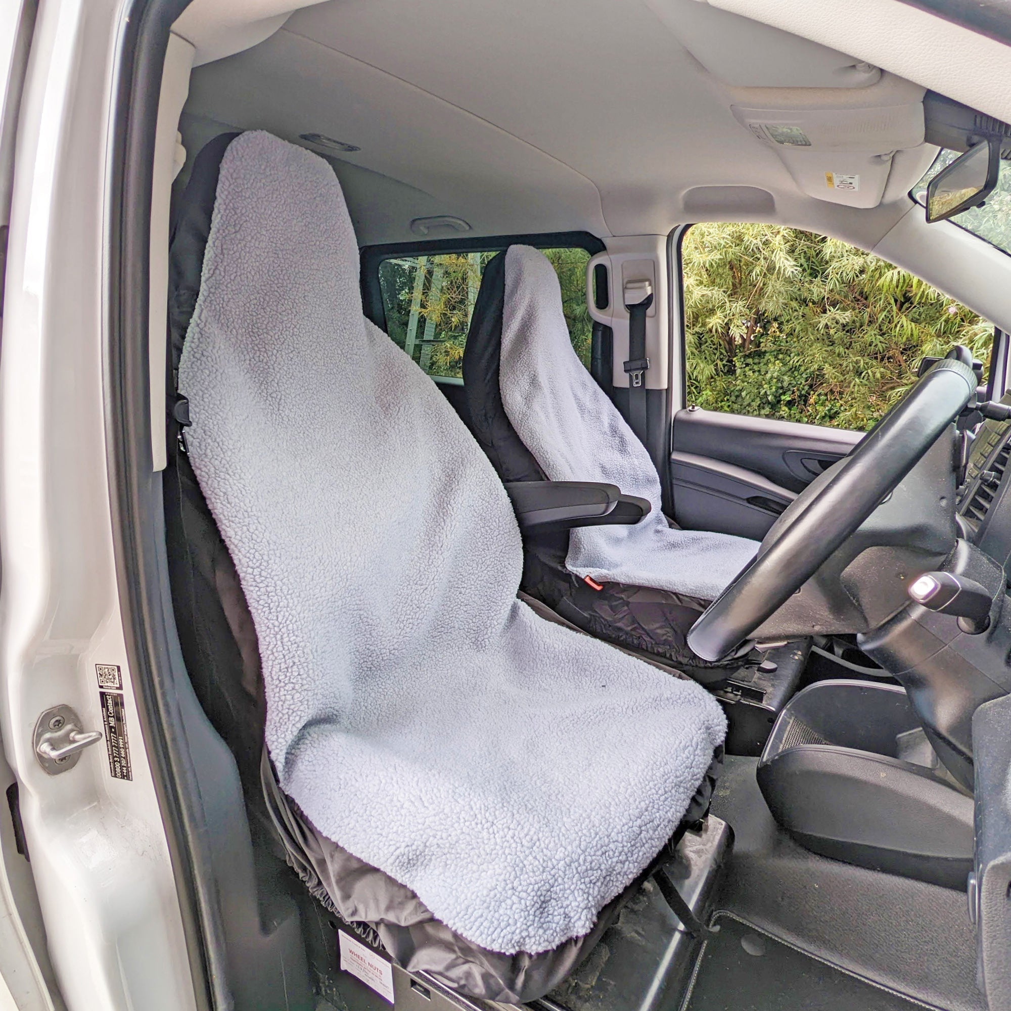 Fluffy universal van seat covers in vehicle