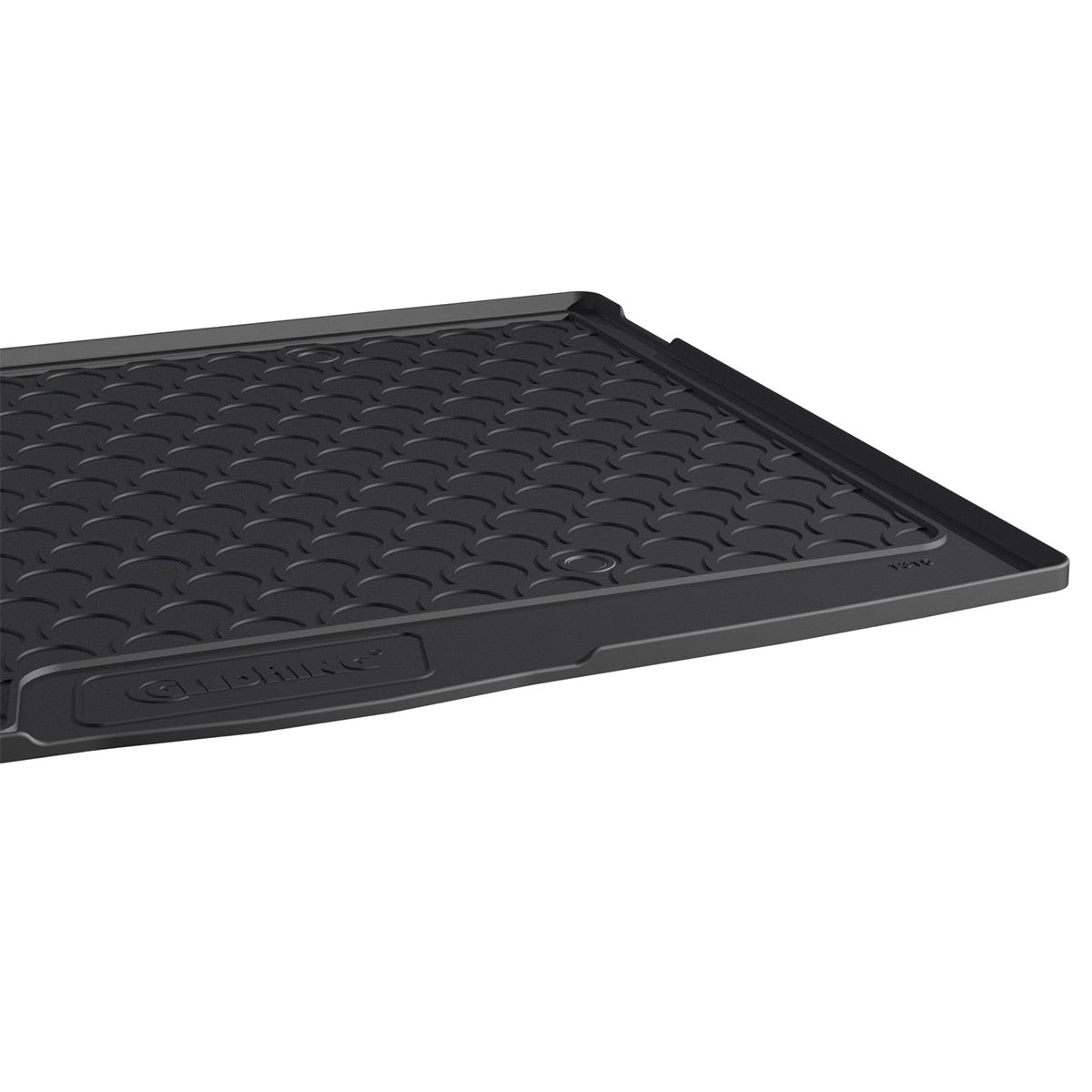 Black car mat with a textured surface on a white background