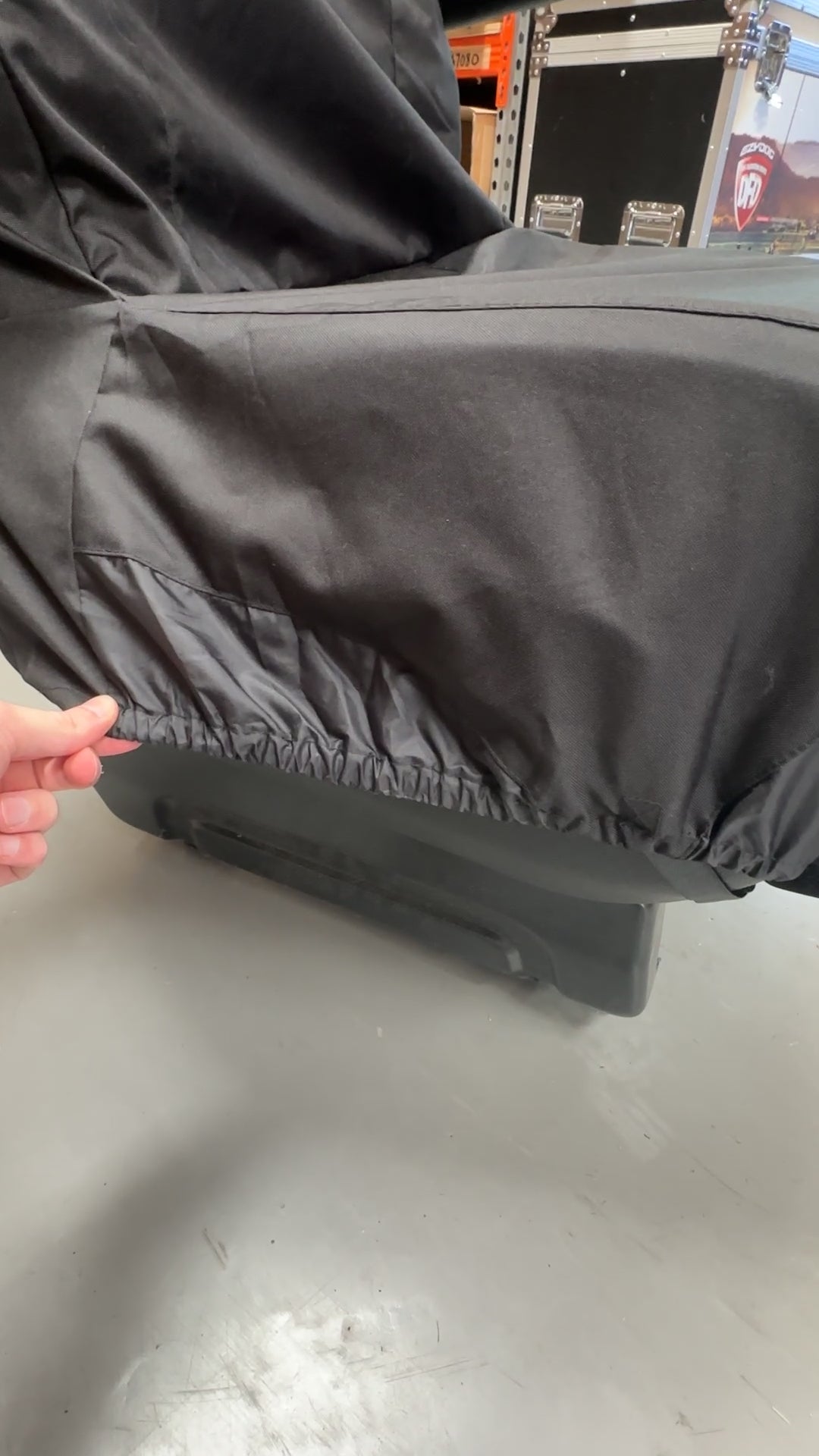 Seat cover elasticated hem